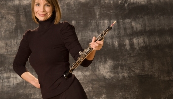 smiling woman with oboe